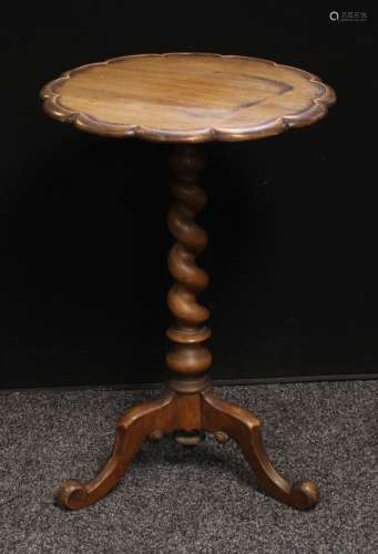 A Victorian mahogany tripod wine table, shaped circular top, barley twist support, scroll legs, 69.
