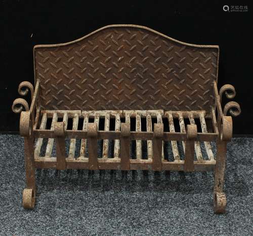 A cast iron country house fire basket