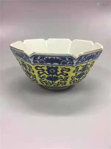 A QING DYNASTY YONGZHENG YELLOW GROUND BLUE AND WHITE BOWL