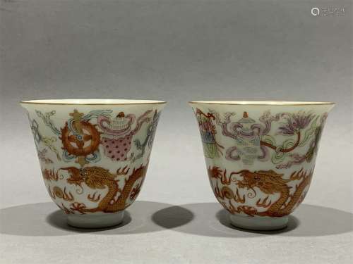 A pair of famille rose tea cups with dragon pattern and Babao pattern