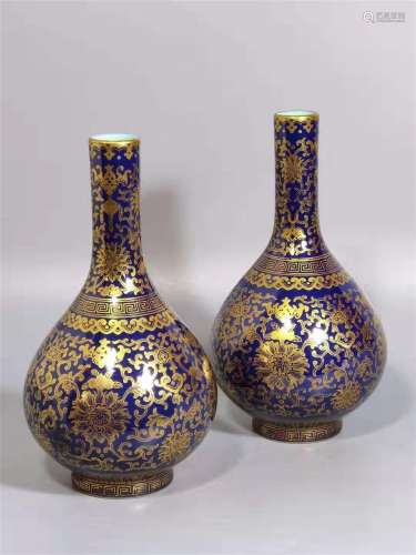 A PAIR OF QING DYNASTY QIANLONG JI BLUE GLAZE WITH GOLD LOTUS FLOWER BOTTLES