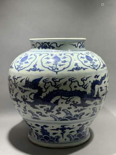 Blue and white dragon shaped pot