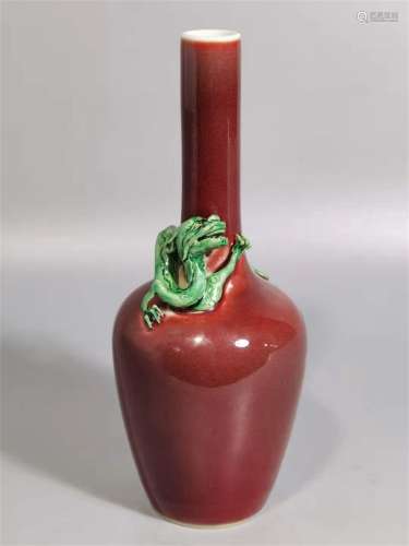 A QING DYNASTY KANGXI SHINY RED GLAZE WITH CHI DRAGON BOTTLE