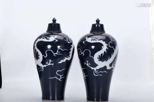 A PAIR OF YUAN DYNASTY DRAGON DESIGN PLUM BOTTLES WITH LIDS