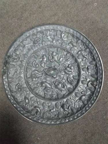 A TANG DYNASTY SEA BEAST GRAPE MIRROR