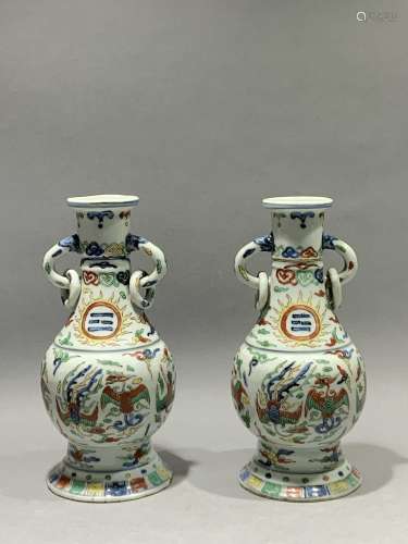 A pair of two ear bottles decorated with colorful phoenix pattern