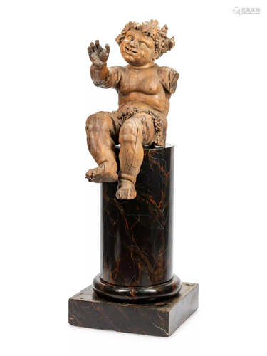 An Italian Carved Wood Figure of Bacchus on a Later