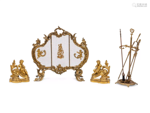A Louis XV Style Gilt Bronze Four-Piece Fireplace Set