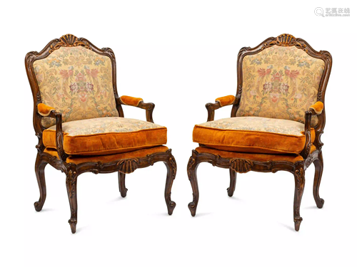 A Pair of Louis XV Style Walnut Fauteuils