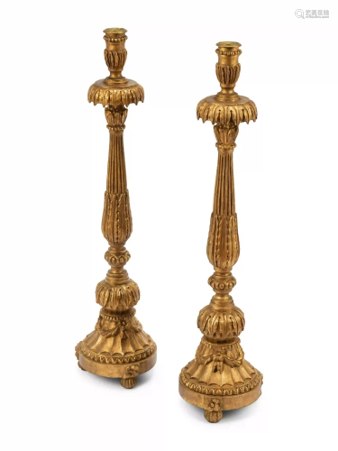 A Pair of Italian Neoclassical Carved and Parcel Gilt