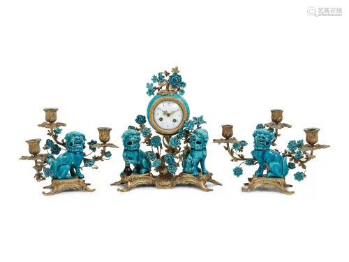 A Louis XV Style Gilt Bronze and Porcelain Clock