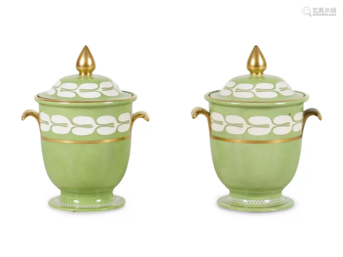 A Pair of Porcelain Covered Urns