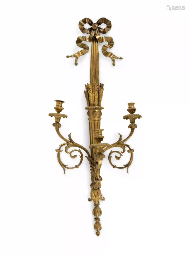 A Louis XVI Style Gilt and Patinated Bronze Three-Light