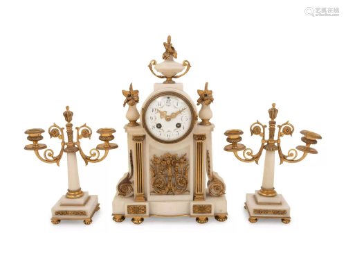 A Louis XVI Style Gilt Bronze Mounted Clock Garniture