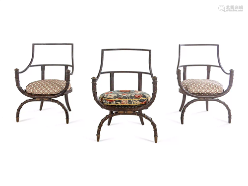 A Set of Three Painted Metal Curule Armchairs