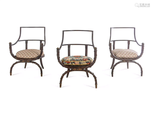 A Set of Three Painted Metal Curule Armchairs