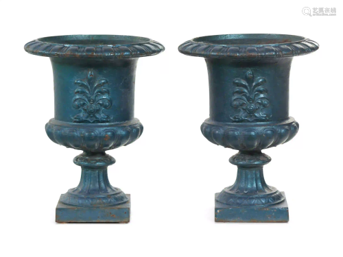 A Pair of Painted Iron Garden Urns