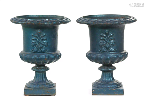 A Pair of Painted Iron Garden Urns