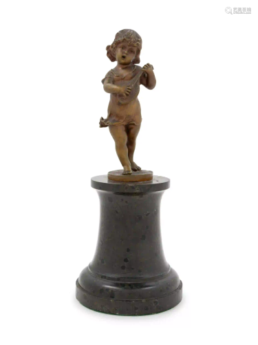 A Continental Bronze Putto on a Marble Base