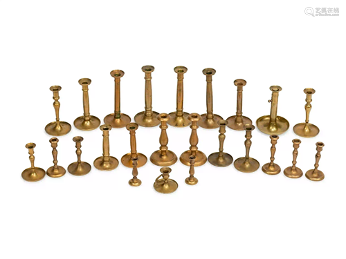 Twenty-Four English Brass Candlesticks