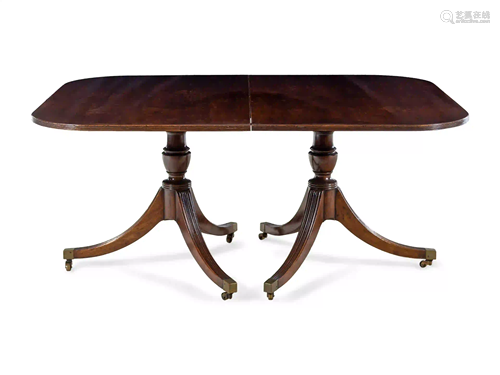 A George III Style Mahogany Triple-Pedestal Dining