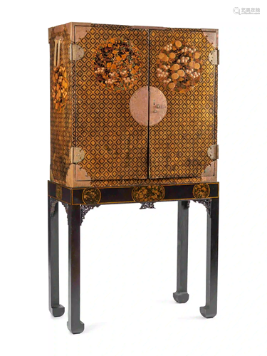 A Japanese Export Lacquer Cabinet on Stand