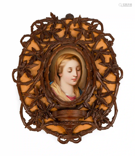 A Continental Porcelain Plaque in a Carved Oak Frame