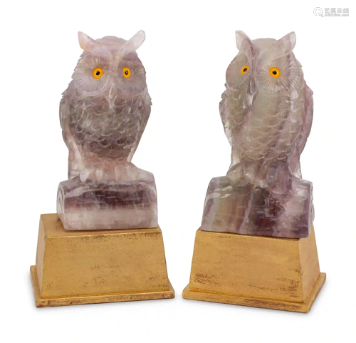 A Pair of Carved Amethyst Owls with Carved Wood Bases