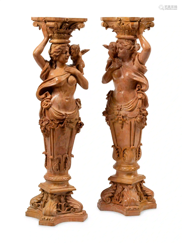 A Pair of Carved Marble Figural Pedestals