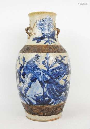 CHINE NANKIN : Vase en grès à décor blanc bleu de …