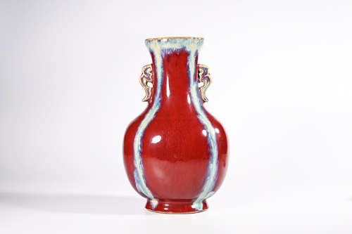 A TWIN-EARED FLAMBE GLAZED PORCELAIN ZUN VASE