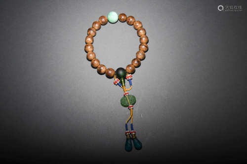 A CHENXIANG AND JADEITE BEADS BRACELET
