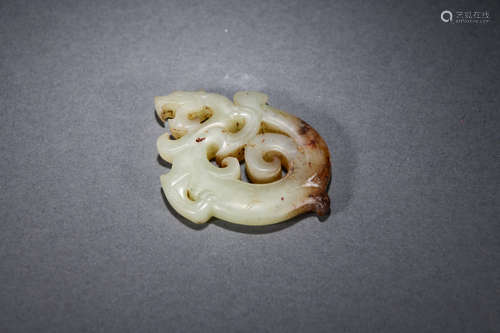 A DRAGON SHAPED JADE PENDANT