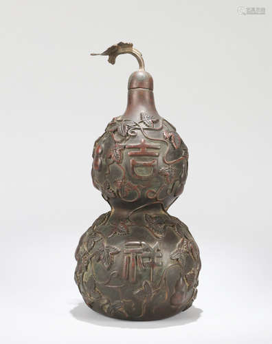 A DOUBLE GOURD-SHAPED COPPER VASE