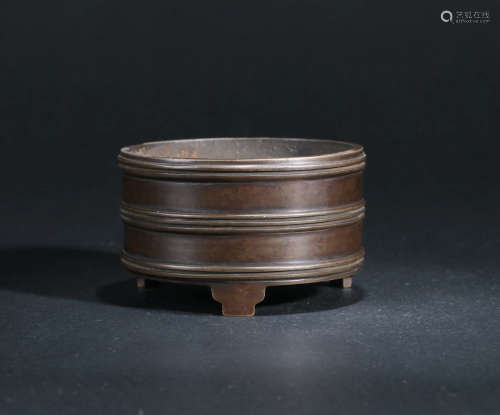 A COPPER CENSER WITH STRING PATTERN