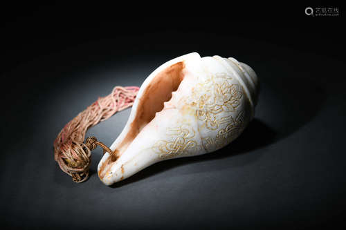 A SHELL ORNAMENT