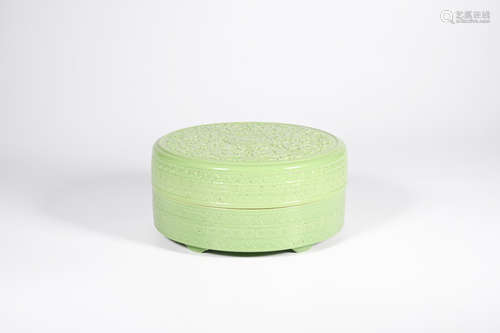 A GREEN GLAZED DRAGON CARVED PORCELAIN BOX