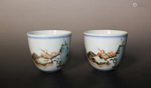 A PAIR OF INSCRIBED PORCELAIN CUPS