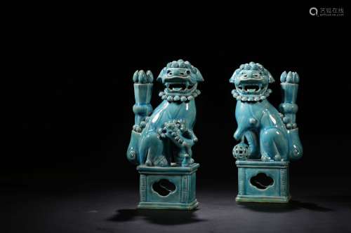 CHINESE PAIR OF BLUE GLAZED CANDLE STANDS
