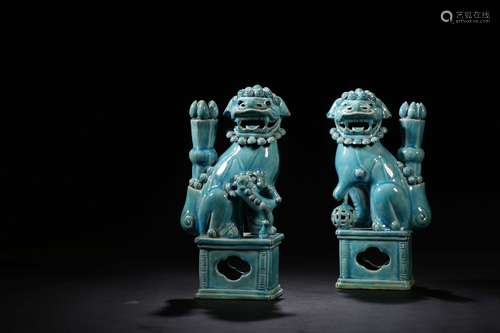 CHINESE PAIR OF BLUE GLAZED CANDLE STANDS