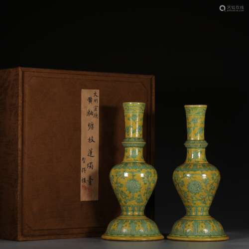 CHINESE YELLOW AND GREEN GLAZED CANDLE STANDS