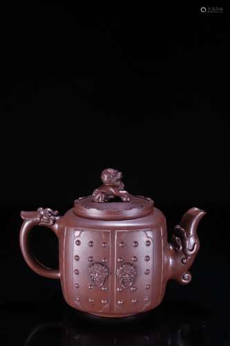 A Zisha Teapot With Beast Carving