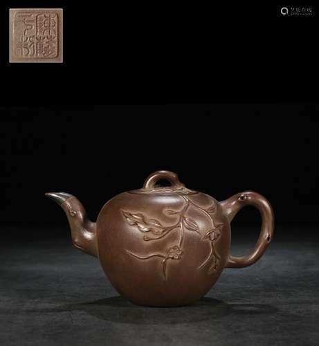 A Zisha Teapot With Plum Pattern