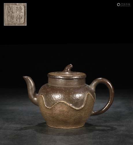 A Zisha Teapot In Melon Shape