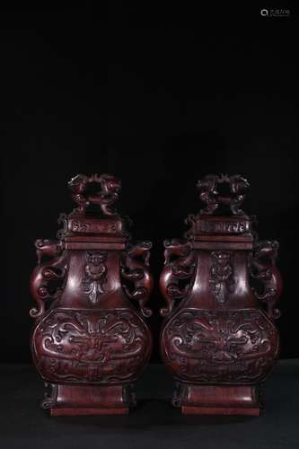 Pair Of Agarwood Beast Carved Vases