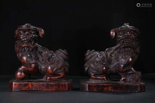 Pair Of Agarwood Paperweights