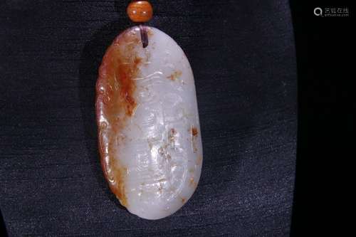 A Hetian Jade Dragon Carved Pendant