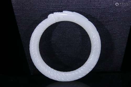 A Hetian Jade Dragon Carved Bangle