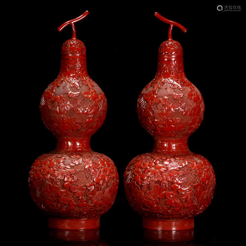 A PAIR OF FLOWERS CARVED RED LACQUER GOURD-SHAPED VASE