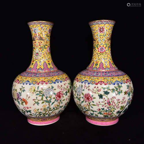 AN ENAMEL FLORAL PORCELAIN VASE